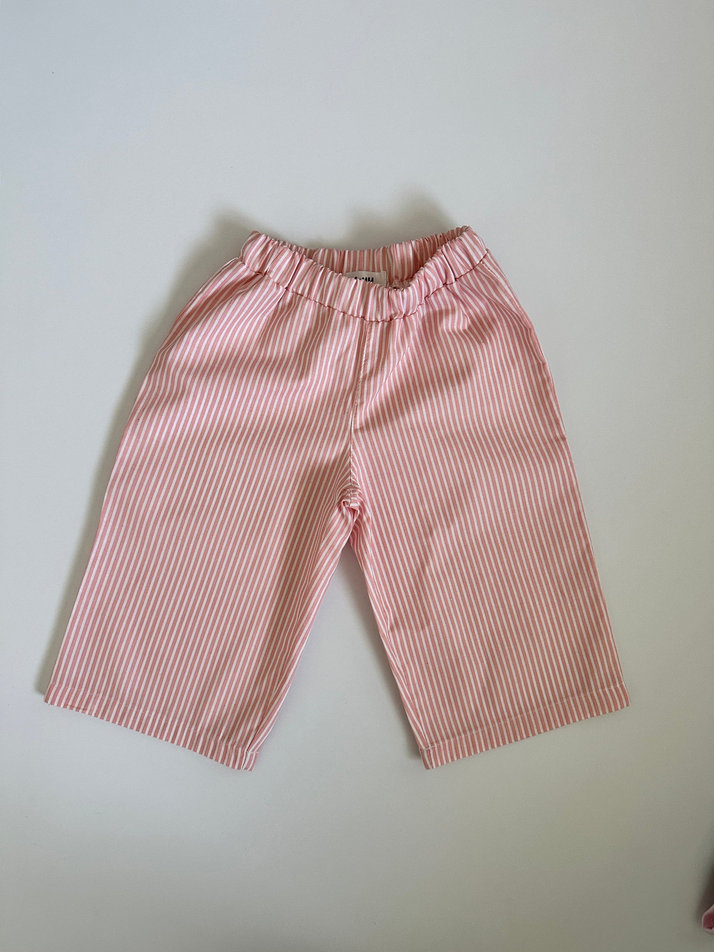 Light pink striped trousers