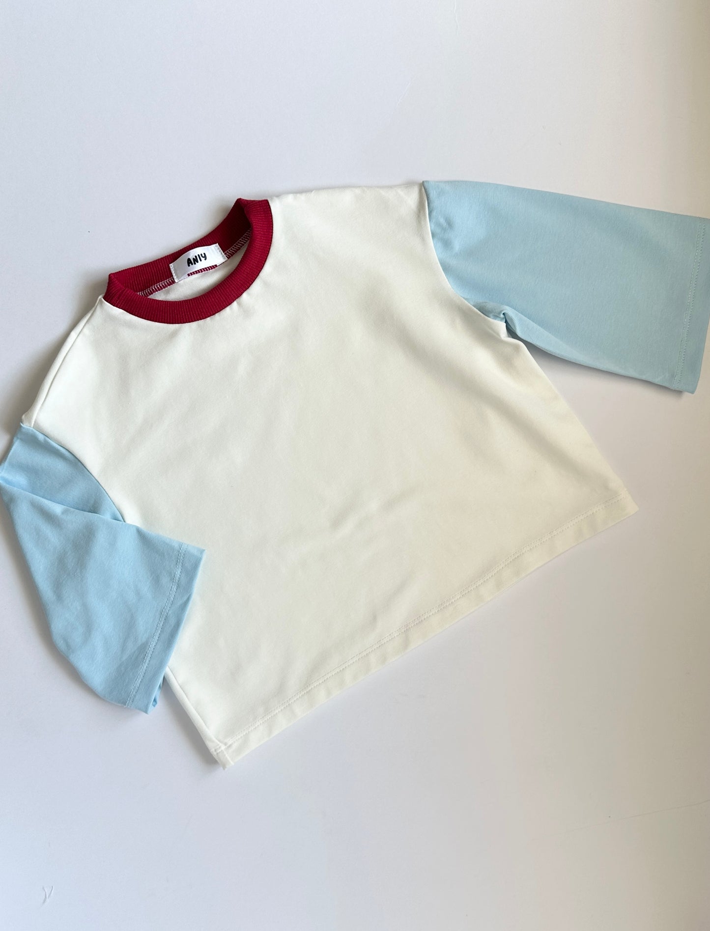 Contrast blue top