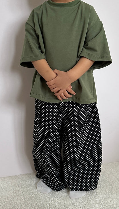 Black polka dot trousers