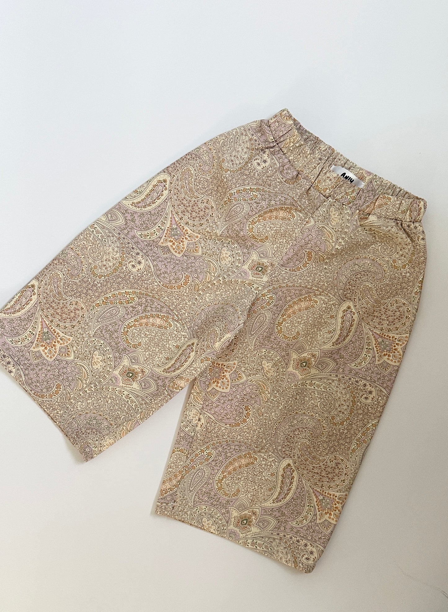 Pink paisley trousers
